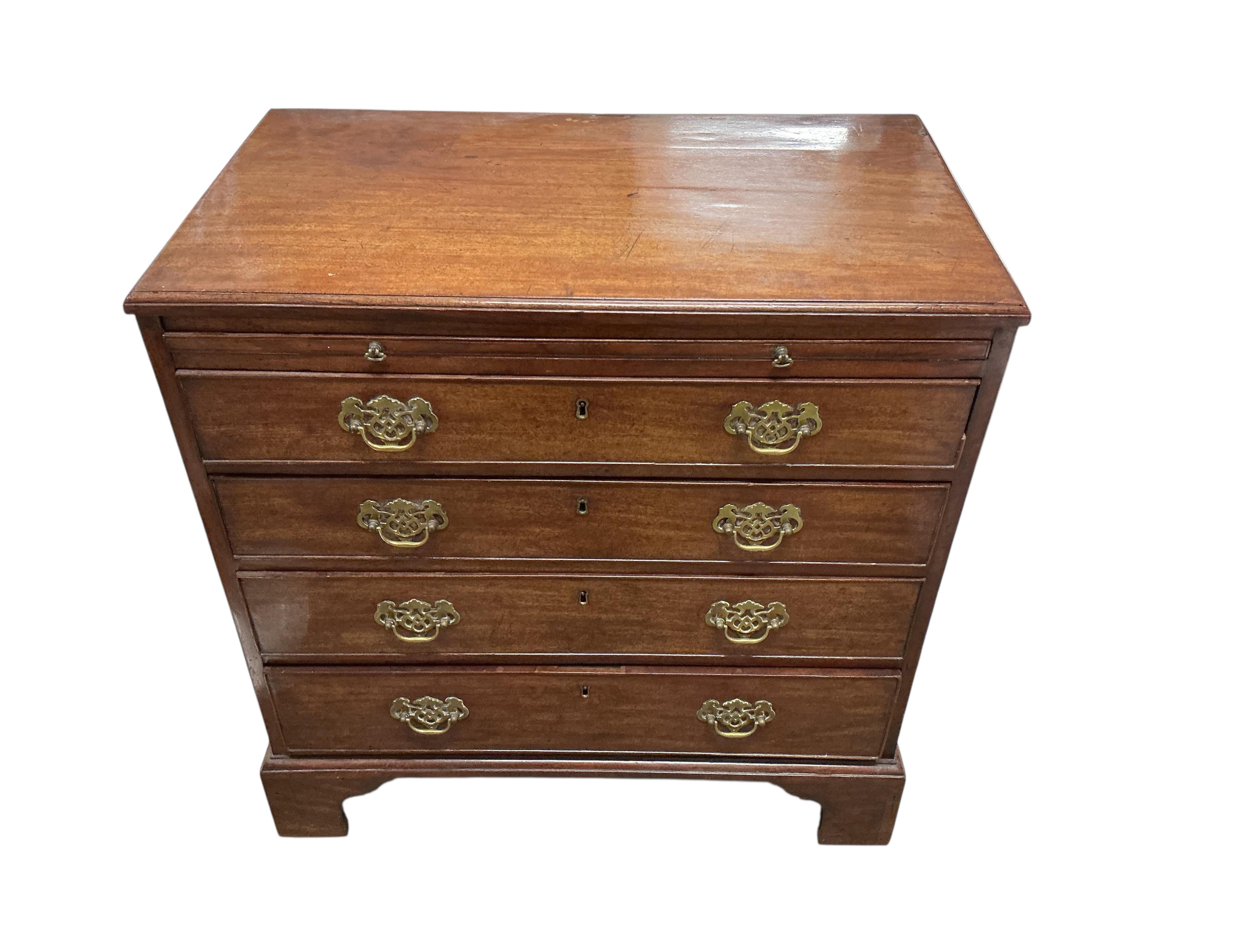 A small George III mahogany four drawer chest with brushing slide, width 78cm, depth 46cm, height 79cm